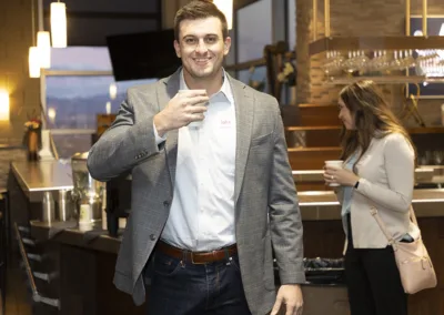 person holding drink at an event