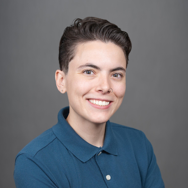 Woman posing for a headshot smiling